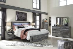 Baystorm - Gray - 5 Pc. - Chest, Queen Panel Bed with 2 Storage Drawers