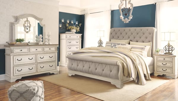 Realyn - Two-tone - 8 Pc. - Dresser, Mirror, Chest, California King Upholstered Sleigh Bed, 2 Nightstands