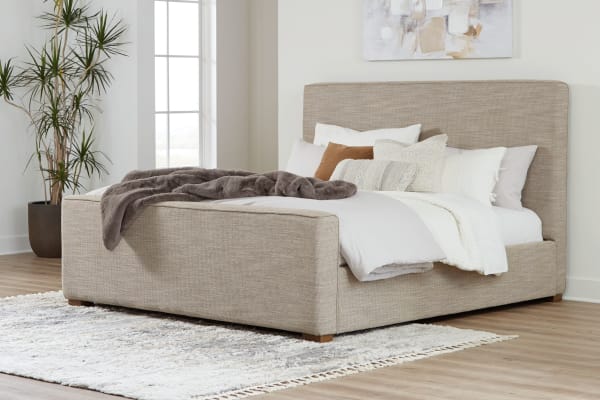 Dakmore - Brown - Queen Upholstered Bed