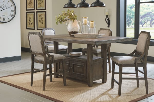 Wyndahl - Rustic Brown - 5 Pc. - Rectangular Counter Table with Storage, 4 Upholstered Barstools