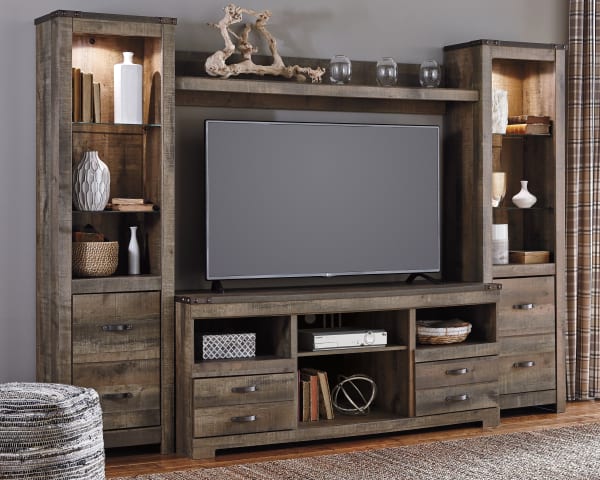 Trinell - 4 Pc. - Entertainment Center - 63" TV Stand - Brown