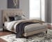 Adelloni - Light Brown - King Uph Hdbd/Ftbd/Roll Slats
