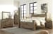 Trinell - King Poster Bed - Brown