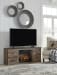 Trinell - Brown - 2 Pc. - 60" Tv Stand With Faux Firebrick Fireplace Insert