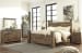 Trinell - King Poster Bed - Brown