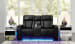 Boyington - Power Reclining Loveseat with Console/ Adj Headrest - Black