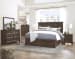 Johurst - Grayish Brown - 7 Pc. - Dresser, Mirror, King Panel Bed with 4 Storage Drawers, 2 Nightstands