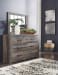 Drystan - Brown / Beige - 9 Pc. - Dresser, Mirror, Chest, King Panel Bed With 2 Side Drawers, 2 Nightstands