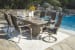 Windon Barn - Brown - 7 Pc. - Fire Pit Table, 4 Arm Chairs, 2 Swivel Chairs