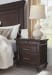 Brynhurst - Dark Brown - 8 Pc. - Dresser, Mirror, Chest, Queen Upholstered Bed with Storage Bench, 2 Nightstands