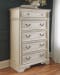 Realyn - Two-tone - 8 Pc. - Dresser, Mirror, Chest, California King Upholstered Panel Bed, 2 Nightstands