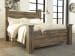 Trinell - King Poster Bed - Brown