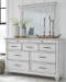 Kanwyn - Whitewash - 5 Pc. - Dresser, Mirror, King Panel Bed With Storage Bench