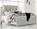 Lindenfield - Champagne - 5 Pc. - Dresser, Mirror, California King Panel Bed