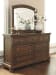 Flynnter - Medium Brown - 6 Pc. - Dresser, Mirror, Chest, California King Sleigh Bed With 2 Storage Drawers