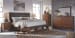 Ralene - Medium Brown - 6 Pc. - Dresser, Mirror, Chest, Queen Upholstered Panel Bed