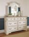 Realyn - Two-tone - 7 Pc. - Dresser, Mirror, King Upholstered Bed, 2 Nightstands