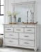 Kanwyn - Whitewash - 5 Pc. - Dresser, Mirror, Queen Panel Bed with Storage Bench