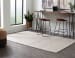 Jossick - 5' x 7' Rug - Cream / Taupe
