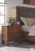 Ralene - Medium Brown - 7 Pc. - Dresser, Mirror, King Upholstered Panel Bed, 2 Nightstands