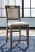 Johurst - Grayish Brown - 5 Pc. - Rectangular Dining Room Counter Table, 4 Upholstered Barstools