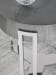 Signature Designs - Iridium Round End Table - Dark Gray