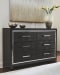Kaydell - Black - 5 Pc. - Dresser, Mirror, Queen Upholstered Glitter Panel Storage Bed
