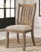 Grindleburg - Light Brown - 7 Pc. - Dining Room Table, 4 Upholstered Side Chairs, Server
