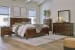 Danabrin - 5 Pc. - Dresser, Mirror, King Panel Bed - Brown