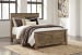 Trinell - Queen Panel Bed - Brown