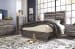 Drystan - Brown / Beige - 7 Pc. - Dresser, Mirror, Queen Panel Bed, 2 Nightstands
