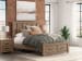 Oliandon - Queen Panel Storage Bed - Light Brown