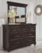 Brynhurst - Dark Brown - 8 Pc. - Dresser, Mirror, Chest, California King Upholstered Bed with Storage Bench, 2 Nightstands