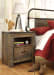 Trinell - Brown - 9 Pc. - Dresser, Mirror, Chest, Twin Panel Bed With Trundle Storage Box, 2 Nightstands