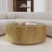 Layne - Round Coffee Table With Casters - Light Brown