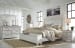 Kanwyn - Whitewash - 8 Pc. - Dresser, Mirror, Chest, California King Panel Bed with Storage Bench, 2 Nightstands