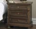 Flynnter - Medium Brown - 6 Pc. - Dresser, Mirror, King Sleigh Bed With 2 Storage Drawers, Nightstand