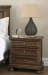Flynnter - Medium Brown - 7 Pc. - Dresser, Mirror, Chest, King Panel Bed, Nightstand