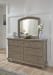 Lettner - Light Gray - 8 Pc. - Dresser, Mirror, Chest, Queen Sleigh Bed with 2 Storage Drawers, 2 Nightstands