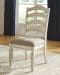 Realyn - White - 9 Pc. - Extension Table, 4 Ladderback Side Chairs, 4 Ribbon Back Side Chairs