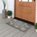 Mohawk Doorscapes Mat Colorful Roots Multi 1'6" x 2'6" Room Scene